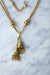 Necklace Negligee gold necklace and pompoms 58 Facettes