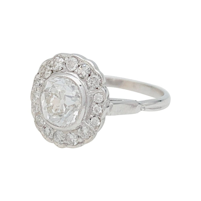 Bague 55 Bague marguerite en or blanc et diamants. 58 Facettes 31177