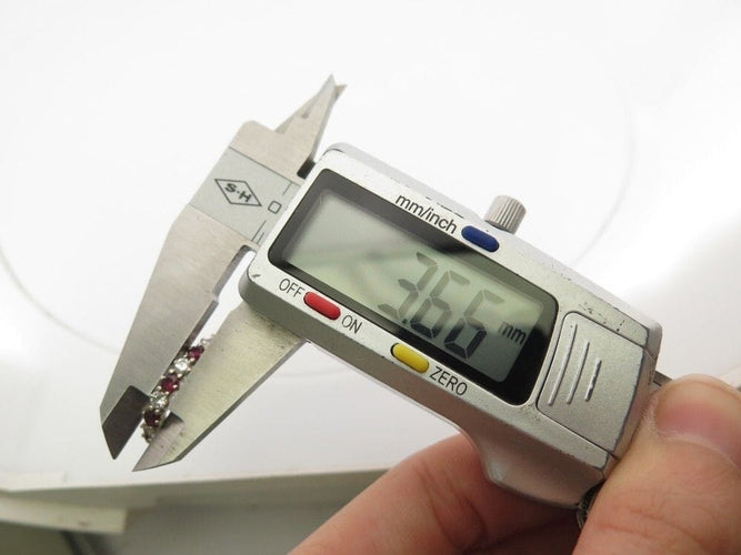 Bague 54 bague alliance 10 diamants et rubis empilable t54 or blanc 18k 58 Facettes 256926