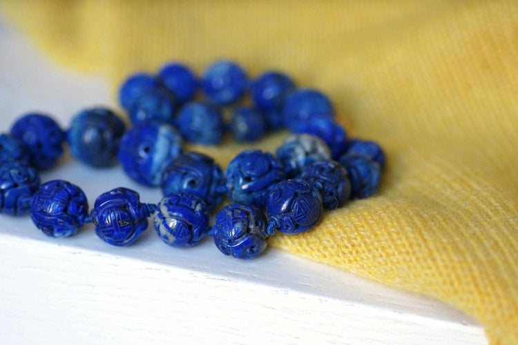 Collier Collier perles de lapis lazuli sculptées 58 Facettes