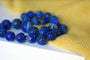 Collier Collier perles de lapis lazuli sculptées 58 Facettes