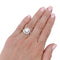 Bague 51 Solitaire Cartier, "Trinity Ruban", platine et diamants. 58 Facettes 32710