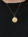 AUGIS pendant - Love medal in gold - More than yesterday, less than tomorrow 58 Facettes J249