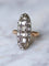 Bague marquise ancienne en or rose, argent, et diamants 58 Facettes