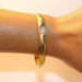 Domed yellow gold bracelet 58 Facettes 10190B