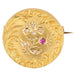 Broche Broche en or jaune au décor floral rubis diamants 58 Facettes 21-542