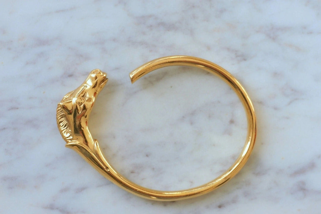 Bracelet Bracelet Hermès doré tête de cheval 58 Facettes