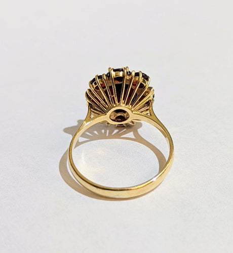 Bague Bague Marguerite or et grenats 58 Facettes