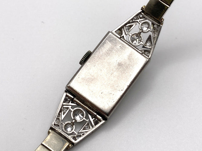 Montre Montre Art Déco platine & or blanc, diamants 2.44 cts 58 Facettes 07/07 - 16