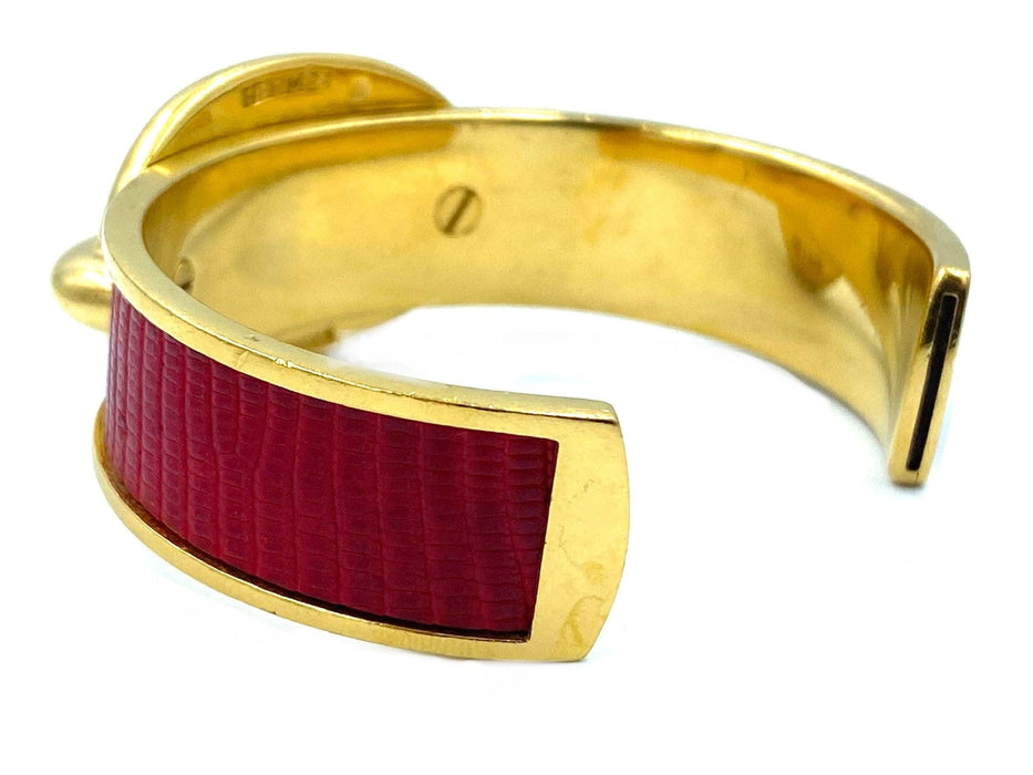 Bracelet Hermès. Bracelet métal doré et cuir 58 Facettes