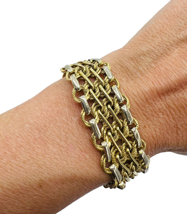 Bracelet bracelet en or en maille souple années 1960 58 Facettes 7374 A