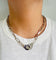 Collier Collier menottes R15,  Dinh Van, en or gris 58 Facettes
