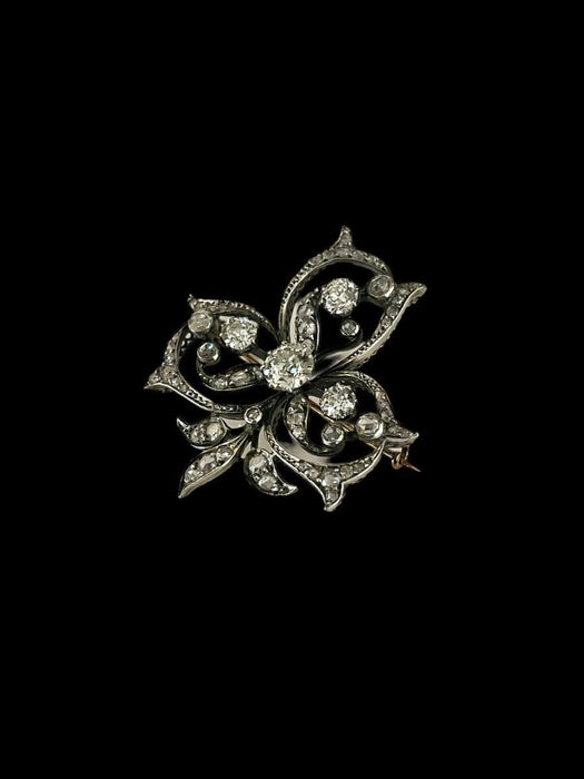 Broche Broche Volutes Diamants XIXème Siècle 58 Facettes