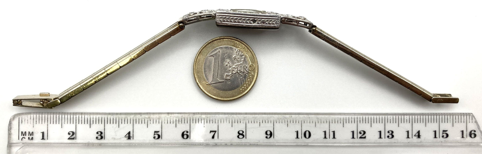 Montre Montre Art Déco platine & or blanc, diamants 2.44 cts 58 Facettes 07/07 - 16