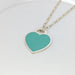 Tiffany & Co pendant - Silver Hearts pendant 58 Facettes 25392