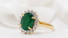 Ring Yellow gold daisy ring with oval emerald and diamonds 58 Facettes 30768