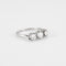 Bague 57 Bague trilogie, or blanc et diamants 58 Facettes P10L8