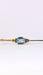 Broche Pin's vintage d'occasion en or 14 carats avec une superbe topaze bleue 58 Facettes 2207041