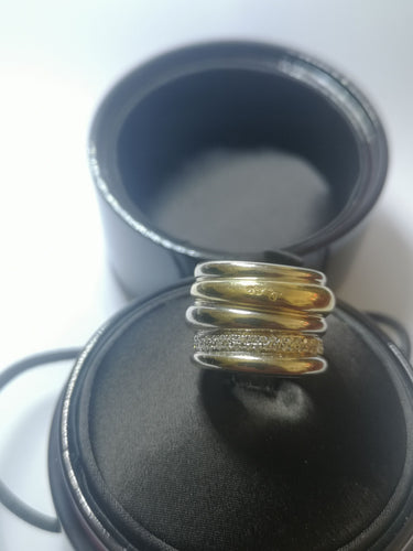 Bague 54 Bague Pomellato Tubolare en or jaune , or blanc et diamants 58 Facettes