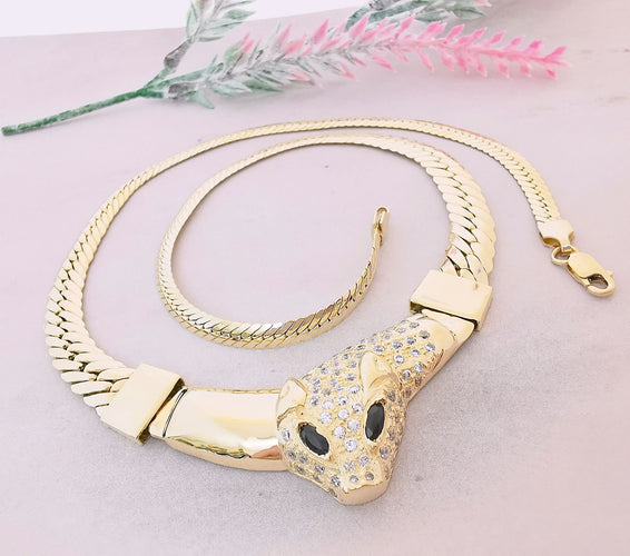 Collier Collier tête de félin Or Jaune 58 Facettes AA 1472