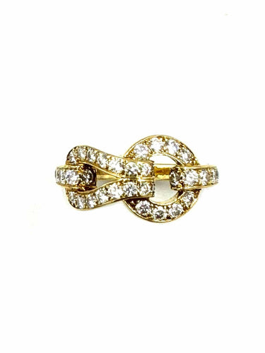 Bague CARTIER. Collection Agrafe, bague en or jaune et diamants 58 Facettes