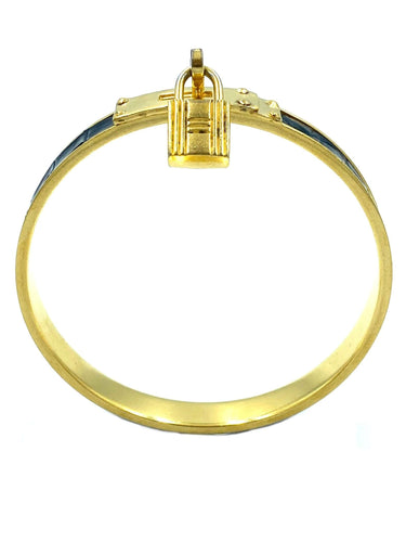 Bracelet Hermès. Bracelet Kelly métal doré et cuir 58 Facettes