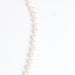 Collier Collier de perles de cultures blanches, fermoir diamants 58 Facettes
