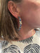 CHANEL LEATHER CREOLE EARRINGS 58 Facettes 051711