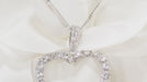 Pendentif Collier cœur en or blanc et diamants 58 Facettes 31990