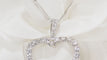 Pendentif Collier cœur en or blanc et diamants 58 Facettes 31990