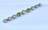 Broche Broche barette en or 18 carats et platine en perles et peridots 58 Facettes AB275