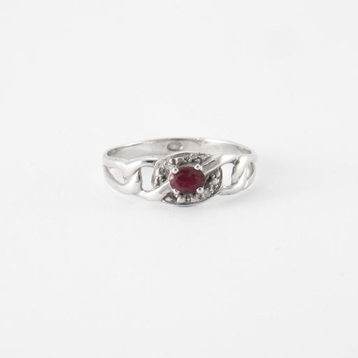 Ring 51 Ring in white gold, diamonds & rubies 58 Facettes