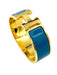 HERMÈS bracelet. Gold metal and enamel bracelet 58 Facettes