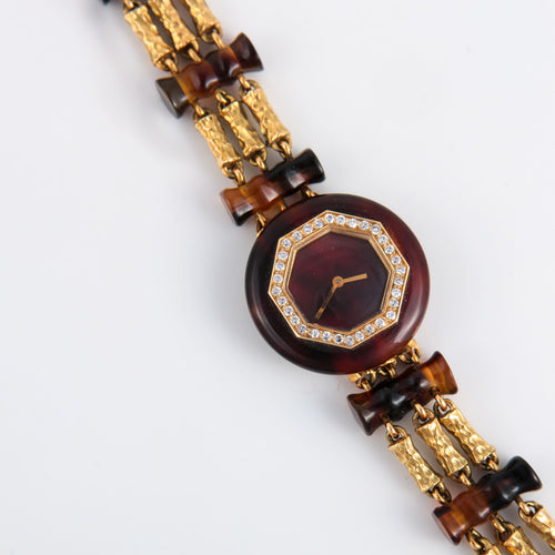 Montre Boucheron Paris - Montre en or et écaille de tortue 58 Facettes