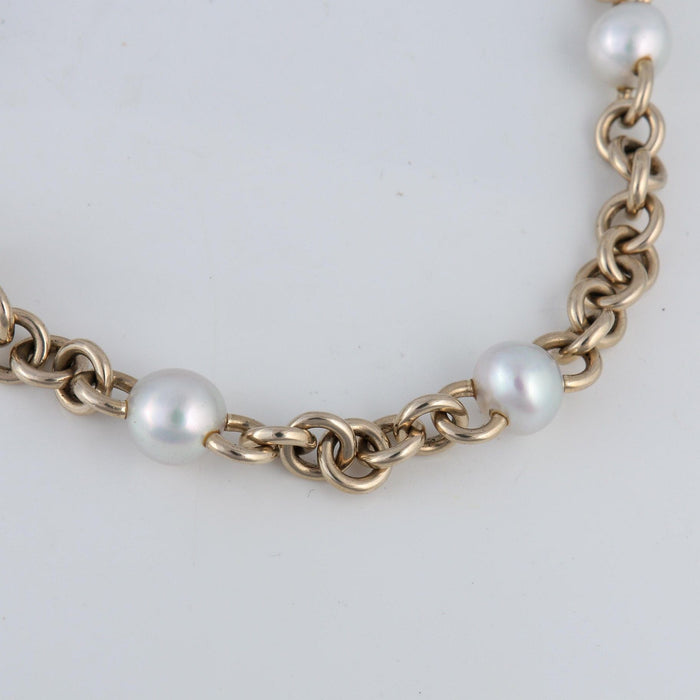 Collier Collier en or gris avec huit perles 58 Facettes