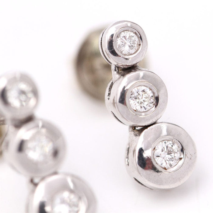 Boucles d'oreilles boucles d'oreilles triples en or blanc et diamants 58 Facettes E360508