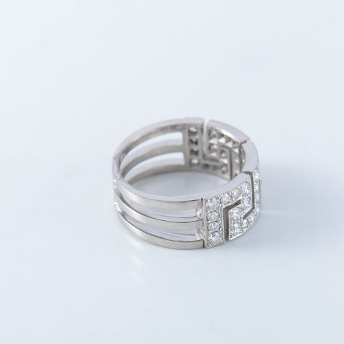 Bague 54 Bague à motifs grecs, diamants et platine 58 Facettes