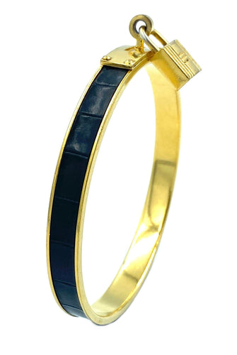 Bracelet Hermès. Bracelet Kelly métal doré et cuir 58 Facettes