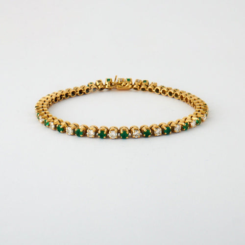 Bracelet BRACELET RIVIERE EMERAUDES ET DIAMANTS OR JAUNE 58 Facettes
