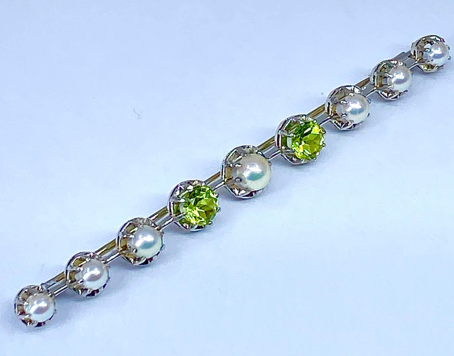 Broche Broche barette en or 18 carats et platine en perles et peridots 58 Facettes AB275