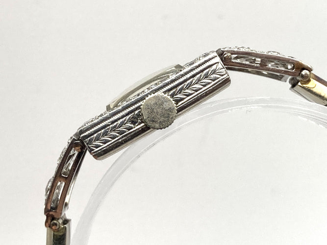 Montre Montre Art Déco platine & or blanc, diamants 2.44 cts 58 Facettes 07/07 - 16