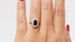 Bague 54 Bague marguerite en or blanc, saphir ovale et diamants 58 Facettes 31322