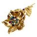 Brooch Cartier brooch, “Fleur” in yellow gold, diamonds, emeralds, rubies and sapphires. 58 Facettes 30236