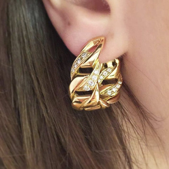 Cartier earrings, "Bergame" model in yellow gold, diamonds.