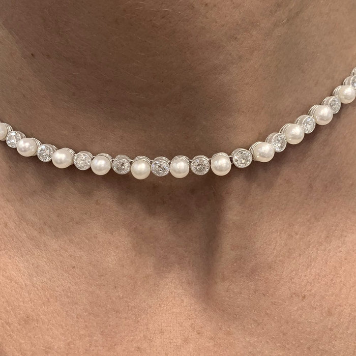 Collier Collier Van Cleef & Arpels transformable en platine, perles fines et diamants. 58 Facettes 30173