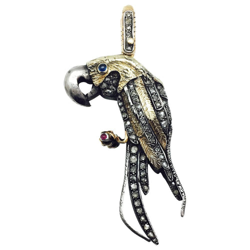 Pendentif Pendentif "Perroquet" en or jaune et argent, rubis, saphirs et diamants. 58 Facettes 26014