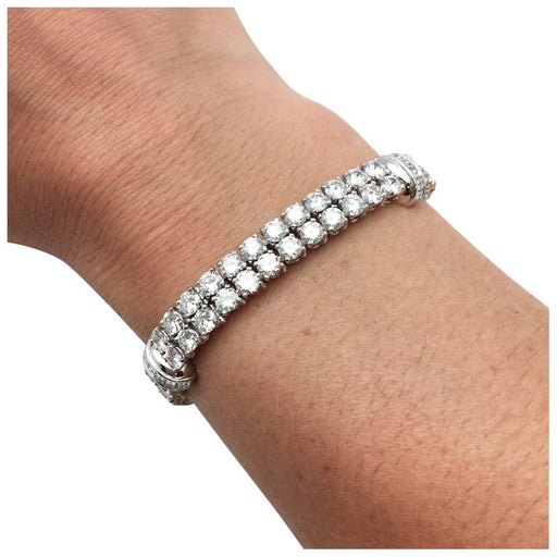 Bracelet Bracelet lignes Cartier, modèle "Calypso"en platine et diamants. 58 Facettes 24877