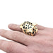 Cartier "Panthère" ring in yellow gold, peridots, lacquer, onyx worn