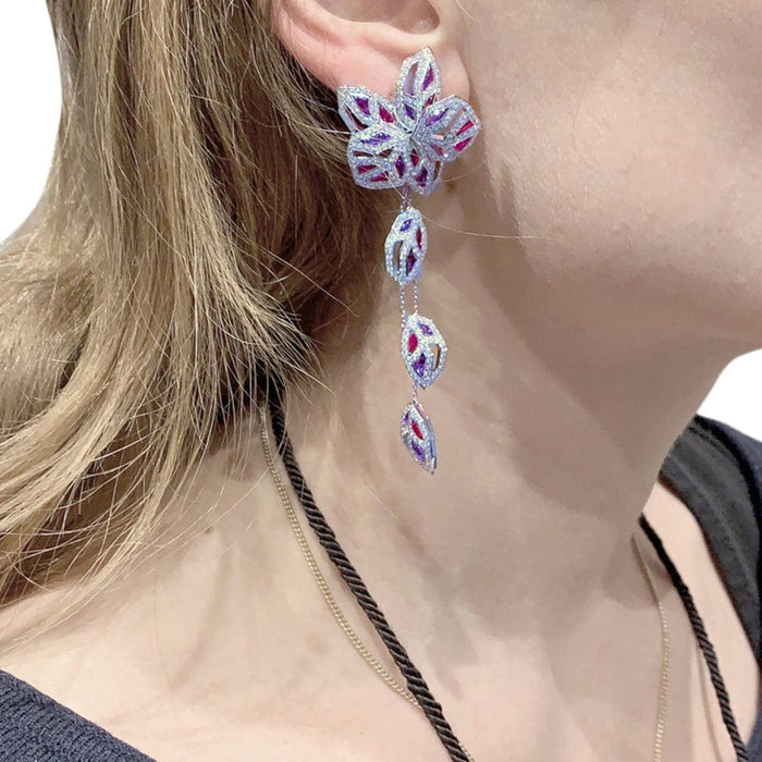 Boucles d'oreilles Boucles d'oreilles Cartier, "Caresse d'Orchidées", or blanc, rubis, améthystes et diamants. 58 Facettes 29822