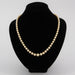 Necklace Falling golden cultured pearl necklace 58 Facettes 20-613